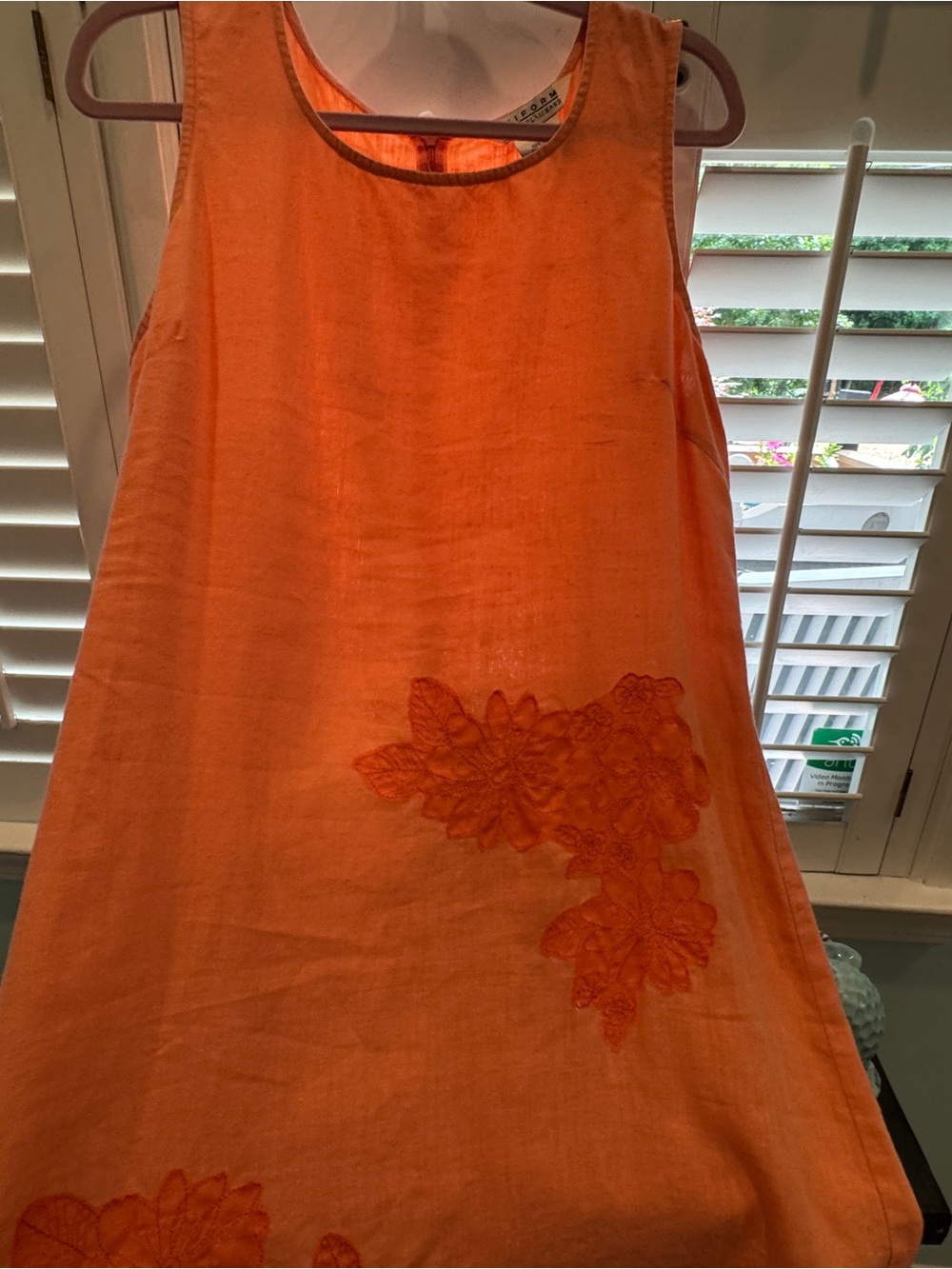 Sleeveless Asymmetrical Coral Dress with Floral Appliqué